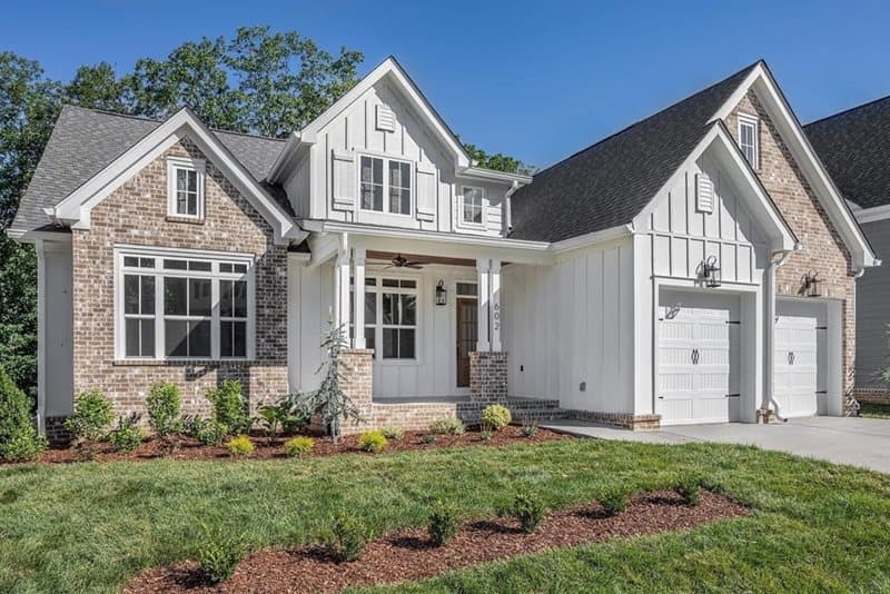 Key Steps for Designing Your Dream Home: Home clad in Arctic White Board and Batten and pale brick Home clad in Arctic White Board and Batten and pale brick